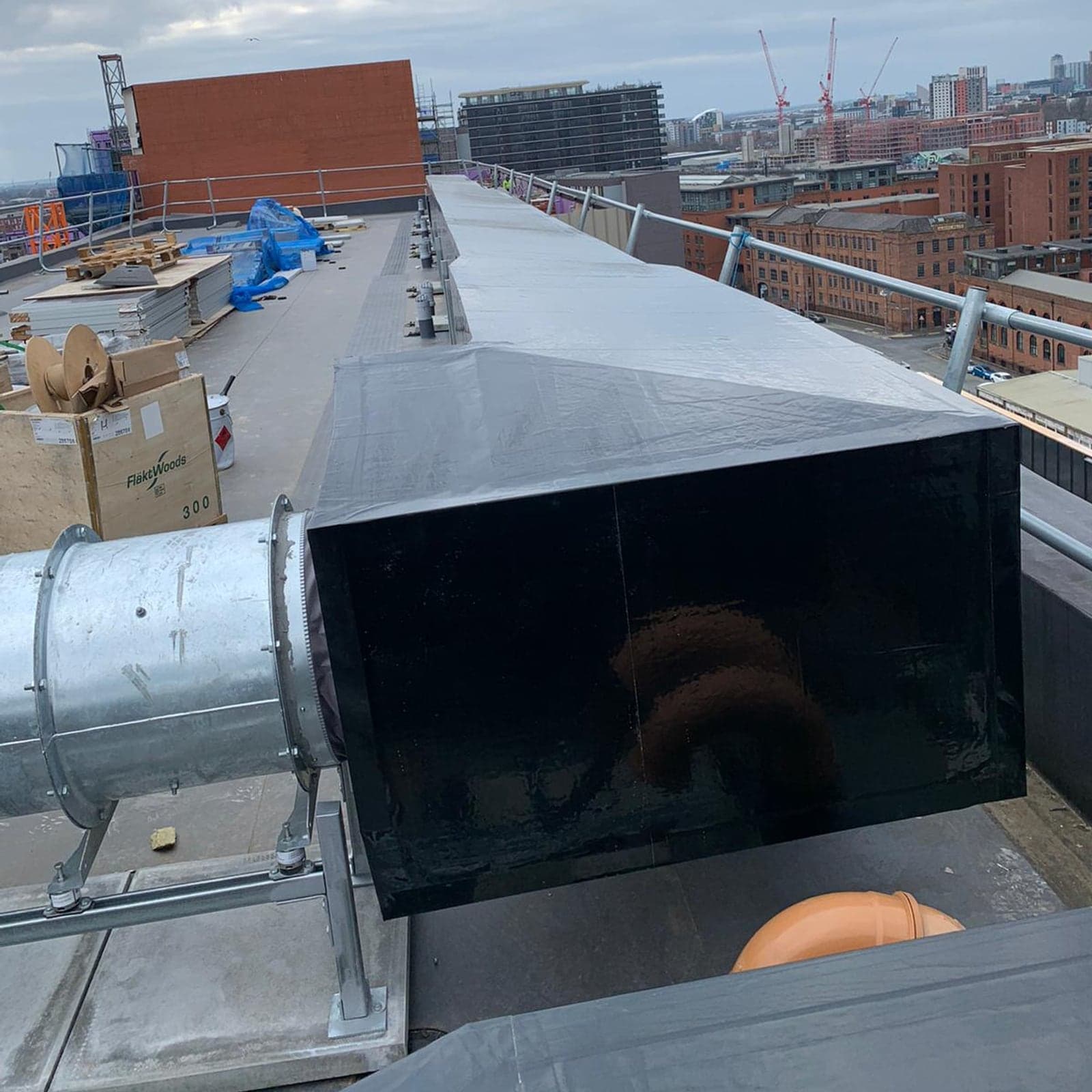 External weatherproof cladding on rooftop ductwork