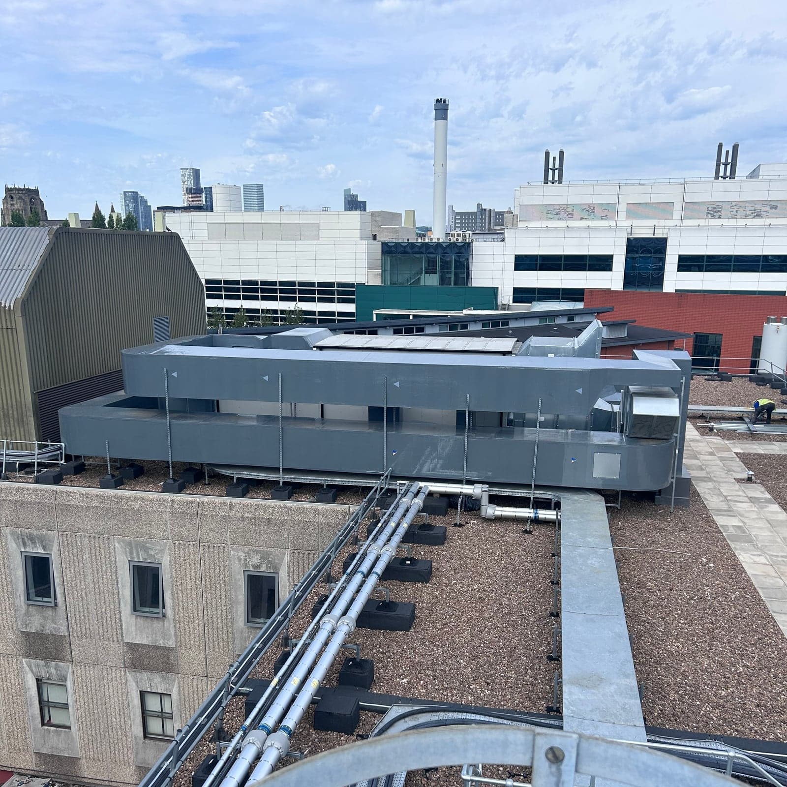 External weatherproof cladding on an external riser