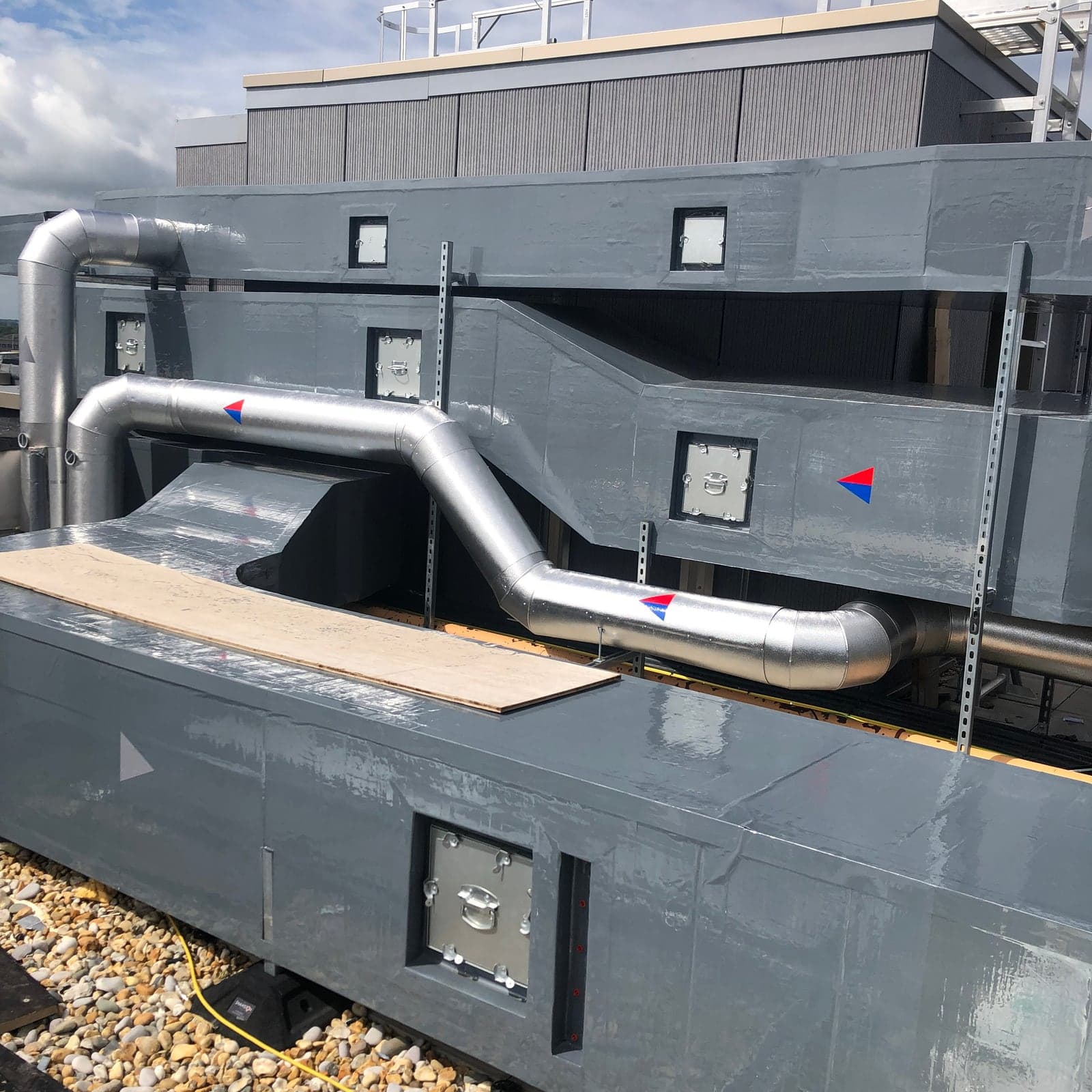 External weatherproof cladding on rooftop plant